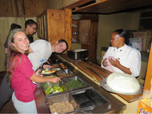 This is the buffet where we eat every meal! And that's Judy one of our cooks!  